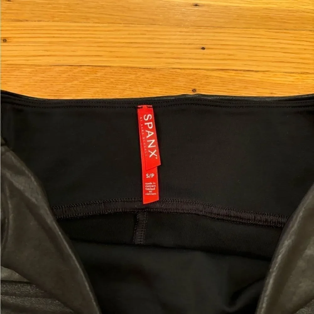 Spanx black faux leather leggings size small